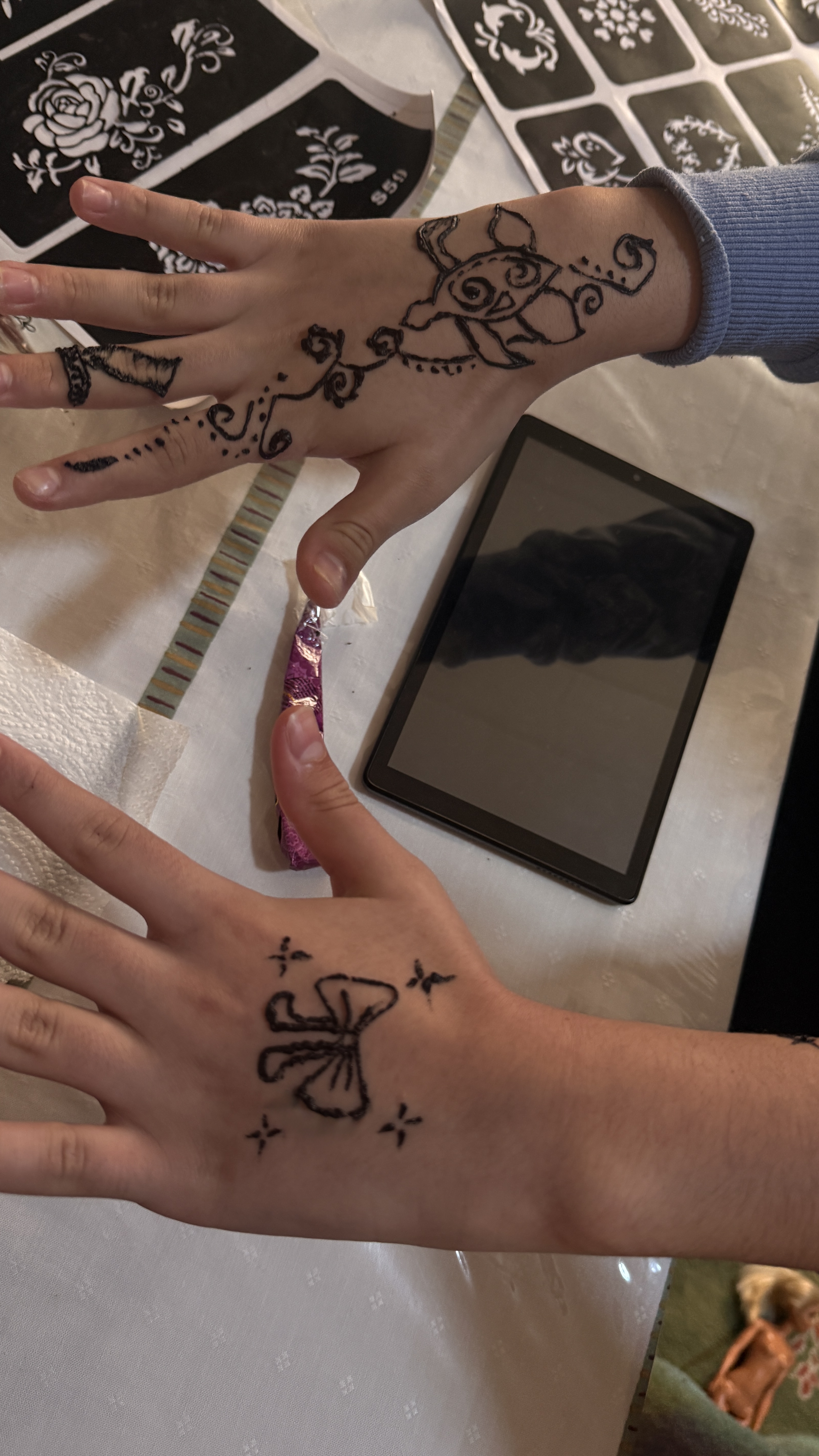 Butterfly and floral henna